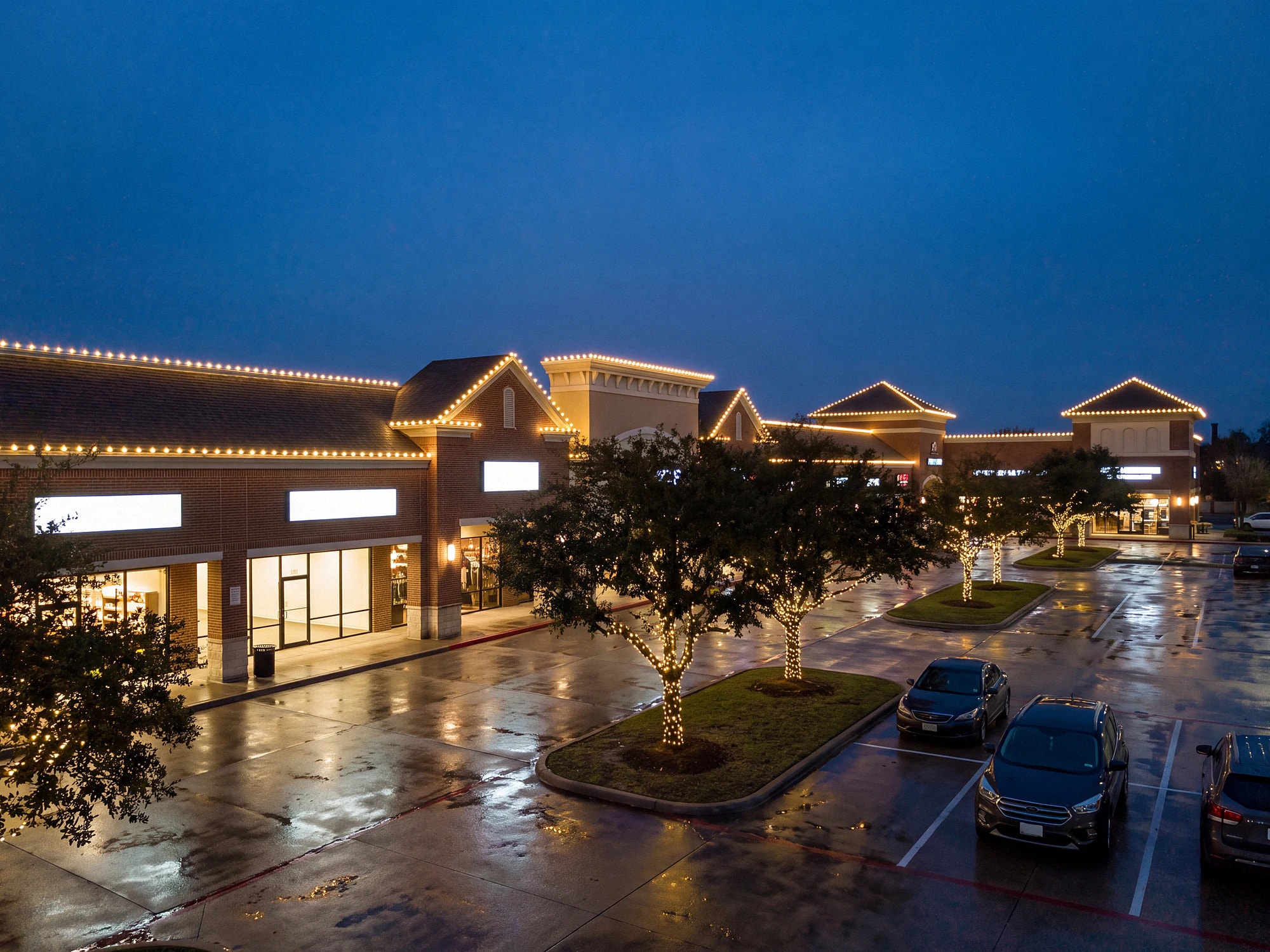 Commercial shopping street with professional holiday lighting